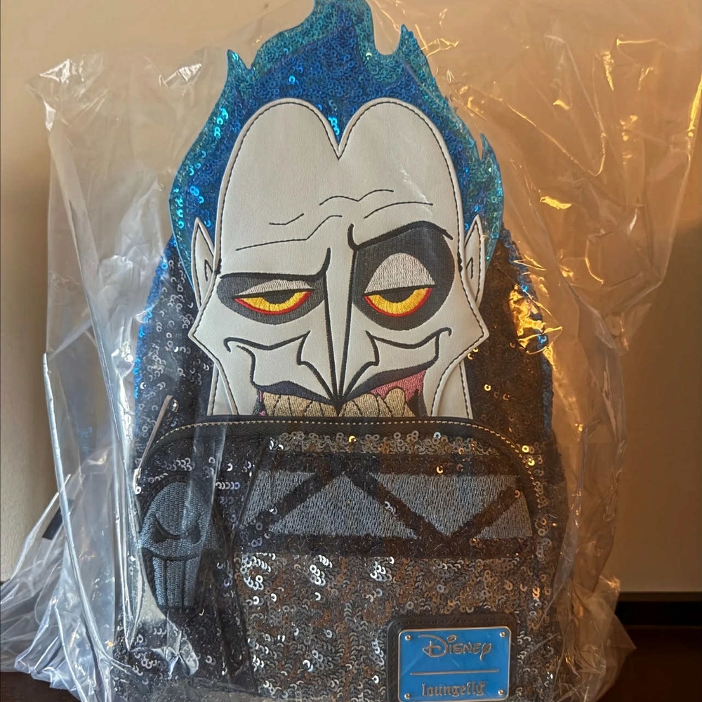 Loungefly Blue and Gray Backpack with Edgy Character Design